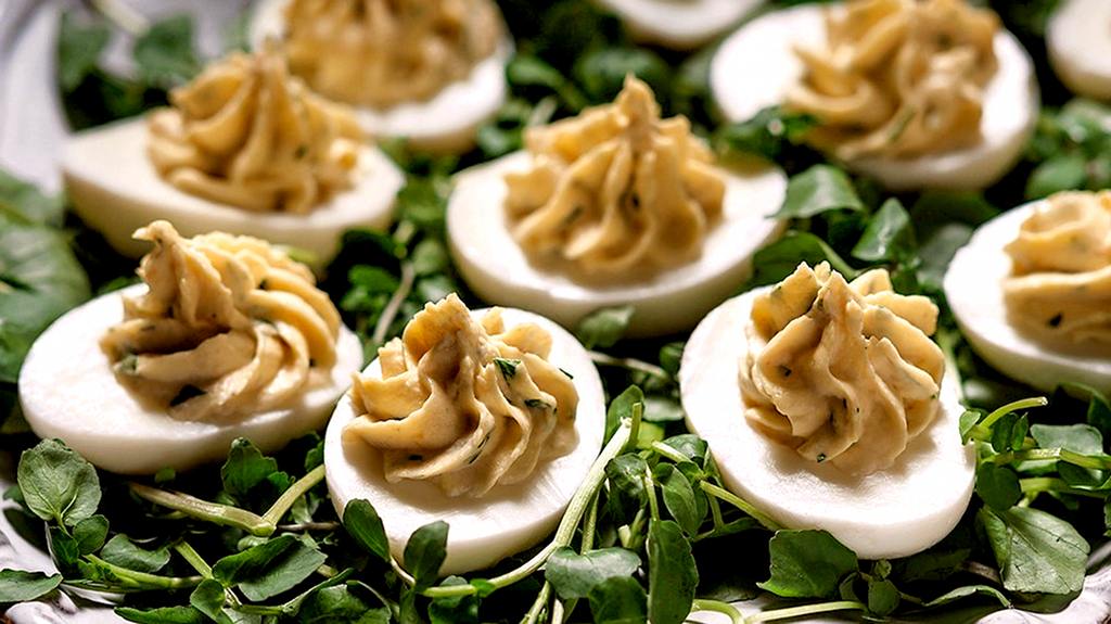 deviled eggs with apricot preserves and curry